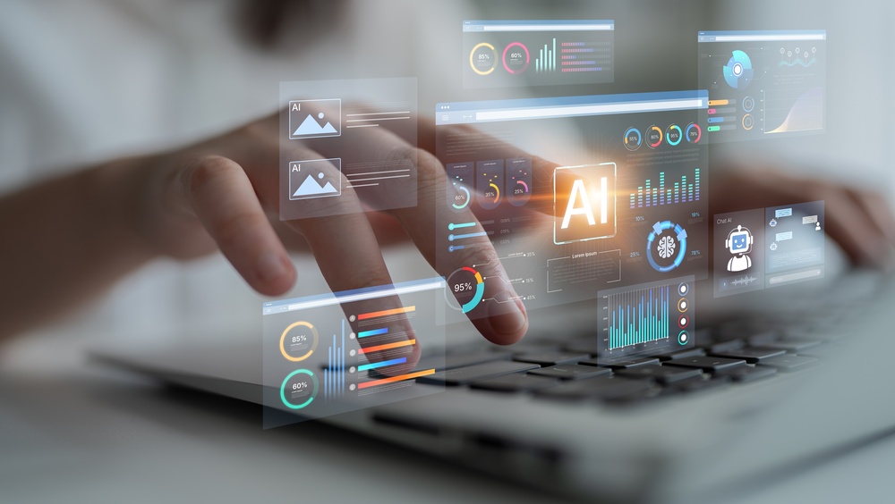 A person interacting with a laptop keyboard overlaid with transparent digital AI analytics dashboards and charts.